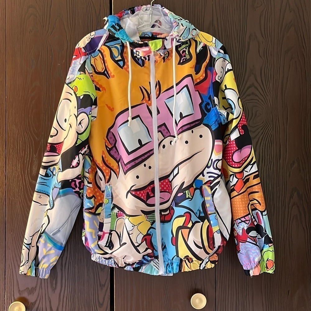 Nickelodeon characters wind breaker jacket. Zips up front. Size Small unisex